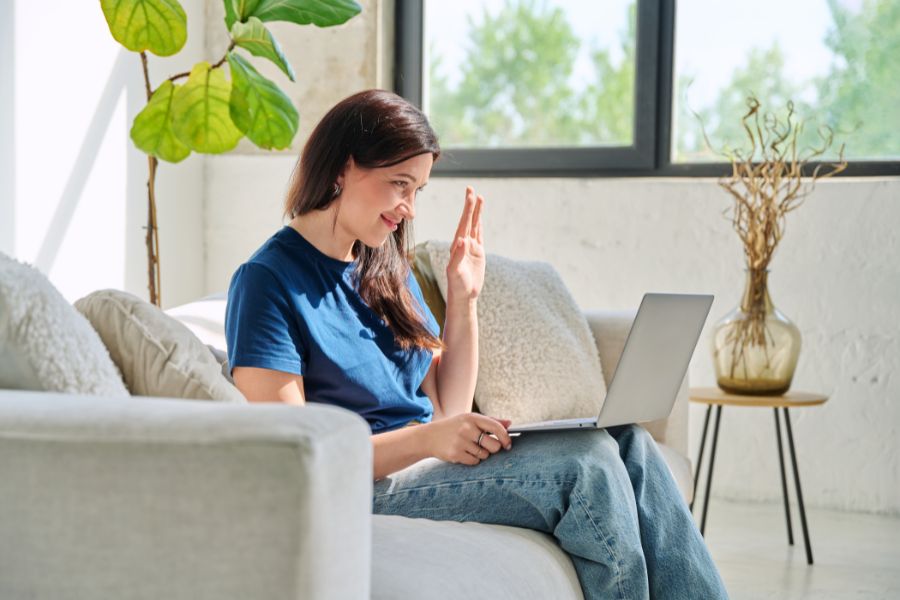 Young woman looking at laptop screen