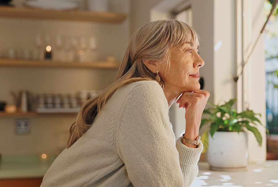 Window,-smile-and-elderly-woman-with-thinking-at-home